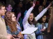 Camas High School junior Hannah Upkes feels the spirit during a rehearsal March 26 with her high school choir.