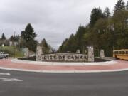 Traffic flows around the roundabout on Northwest Sixth Street near Highway 14. Drivers initially resisted a roundabout at the main entrance to the city but have since adapted to it.