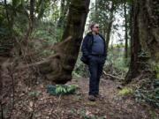 Peter Bracchi of Vancouver stands in a cleared area of Arnold Park where a homeless camp existed. He worries about damage to the park and the health of the homeless people who live there.