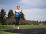 Chloe Lindbo, a Ridgefield High School graduate and Clark College sophomore, is pictured during practice in Vancouver Monday morning, April 9, 2018. Lindbo specializes in the heptathlon, a seven-event specialty that includes the 100-meter hurdles, high jump, shot put, the 200-meter race, long jump, javelin and the 800-meter run.