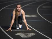 Chloe Lindbo, a Ridgefield High School graduate and Clark College sophomore, is pictured during practice in Vancouver Monday morning, April 9, 2018.