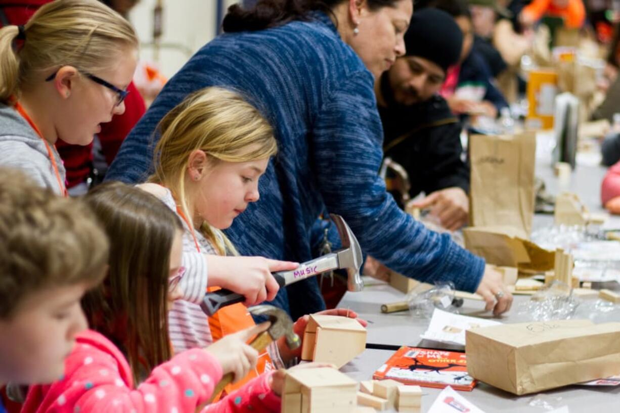 Woodland: The Woodland Reads literacy program kicked off at Home Depot, where Woodland Intermediate School students received wood-block calendar kits so students and their families could make their own calendars to keep up with the monthlong program that encourages kids and their families to read.