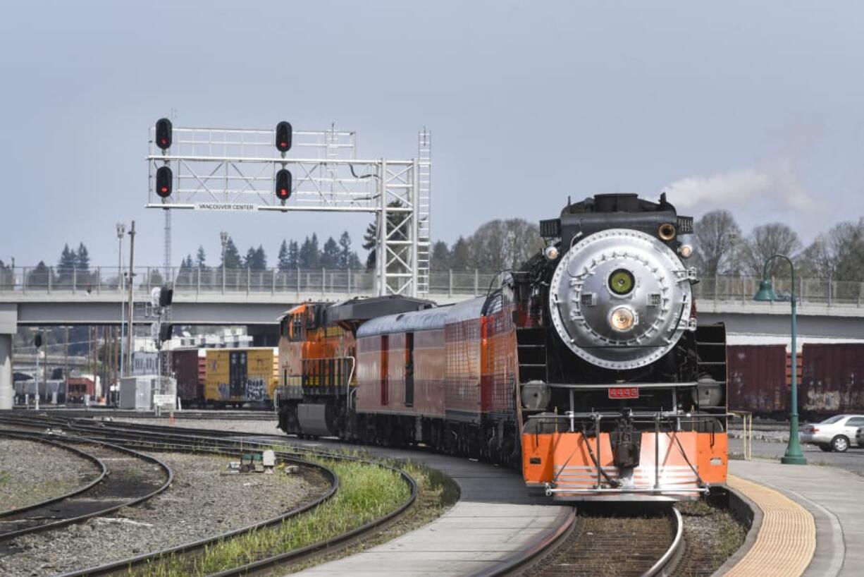 The Southern Pacific 4449 steam locomotive passes through the Vancouver Amtrak station at midday Monday. It will be in Vancouver and the Columbia River Gorge for a few days for a video shoot.