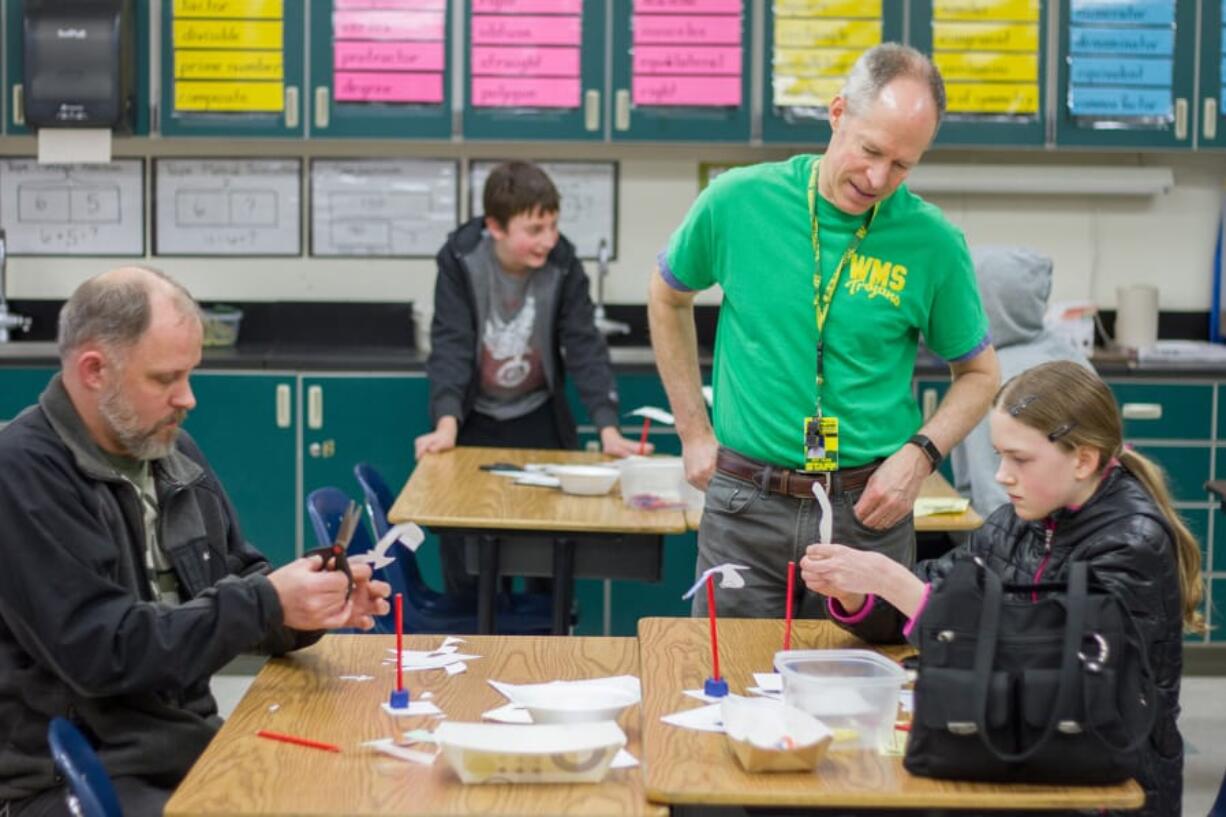 Woodland: Woodland Middle School sixth-grade teacher Geoff Nelson at the school’s PRIDE Night, during which families can come learn about the curriculum at the school and students can meet teachers and tour the building.