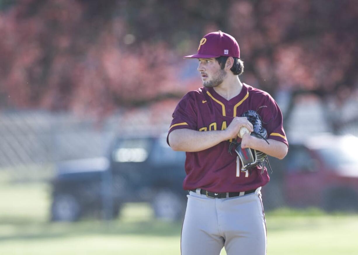 Prairie High School pitcher Caleb Jones prepares to pitch during a game against Fort Vancouver at Fort Vancouver High School, Thursday April 19, 2018.