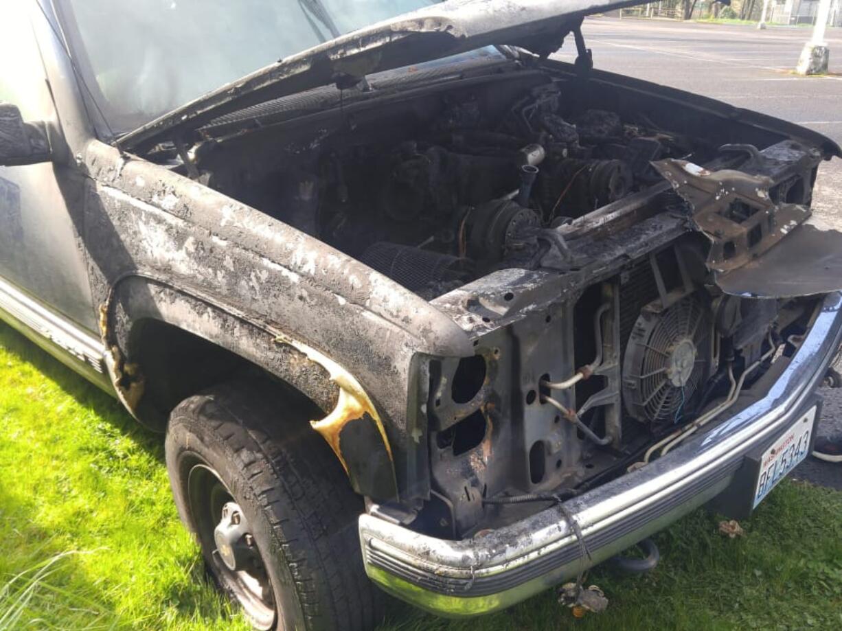 Riveridge: The aftermath of a car fire in a vehicle carrying the Lewis & Clark Young Marines back to Vancouver after they served as color guard at a Portland Trail Blazers game.