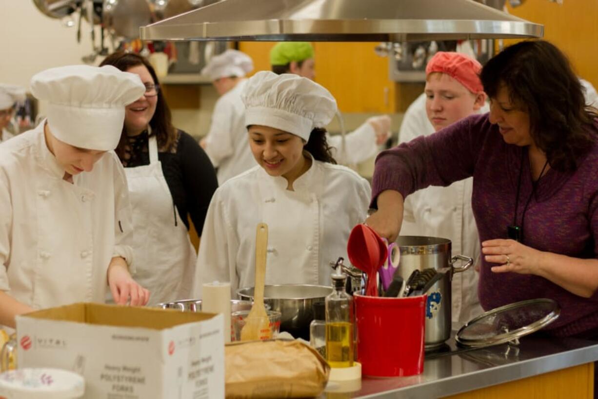 Woodland: Kimberly Miller, right, teaches culinary arts and other career and technical education classes at Woodland High School while also coaching the school’s SkillsUSA Team, which was recently recognized as a National Model of Excellence.