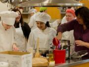 Woodland: Kimberly Miller, right, teaches culinary arts and other career and technical education classes at Woodland High School while also coaching the school’s SkillsUSA Team, which was recently recognized as a National Model of Excellence.