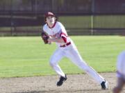 Fort Vancouver junior shortstop Nick Laurenza runs to catch a fly ball during the game against Prairie High School at Fort Vancouver High School, Thursday April 19, 2018.