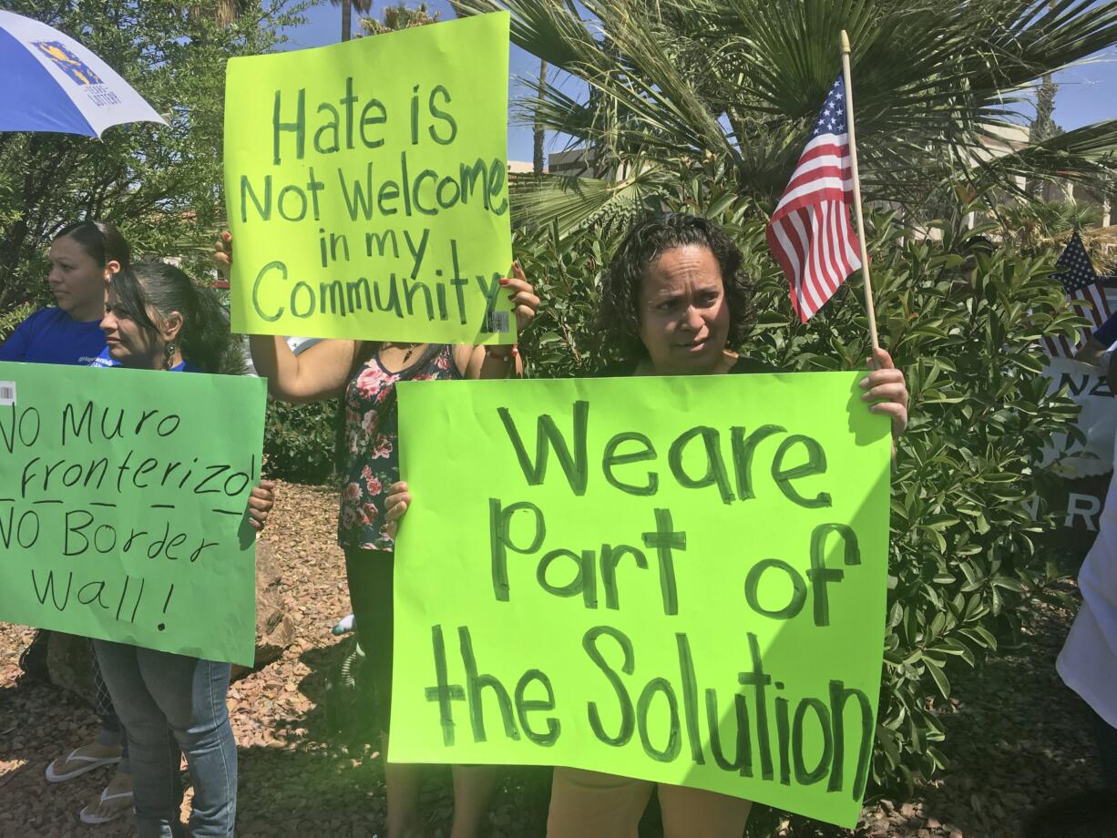 Immigration rights activists protest on Wednesday, April 11, 2018, in Las Cruces, New Mexico, where U.S. Attorney General Jeff Sessions was set to give remarks on immigration enforcement to Southwest border sheriffs. Sessions' visit comes amid a period of especially intense focus within the Trump administration on border security.