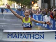 Colleen Little of Lake Oswego, Ore., wins the women's division of the 2012 Portland Marathon in Portland, Ore. After a tumultuous 2017, there will be no 2018 for the Portland Marathon. In an open letter submitted to Mayor Ted Wheeler's office, the Portland Marathon board of directors announced Friday, April 27, 2018, that it had started the process of dissolving the organization. (Randy L.