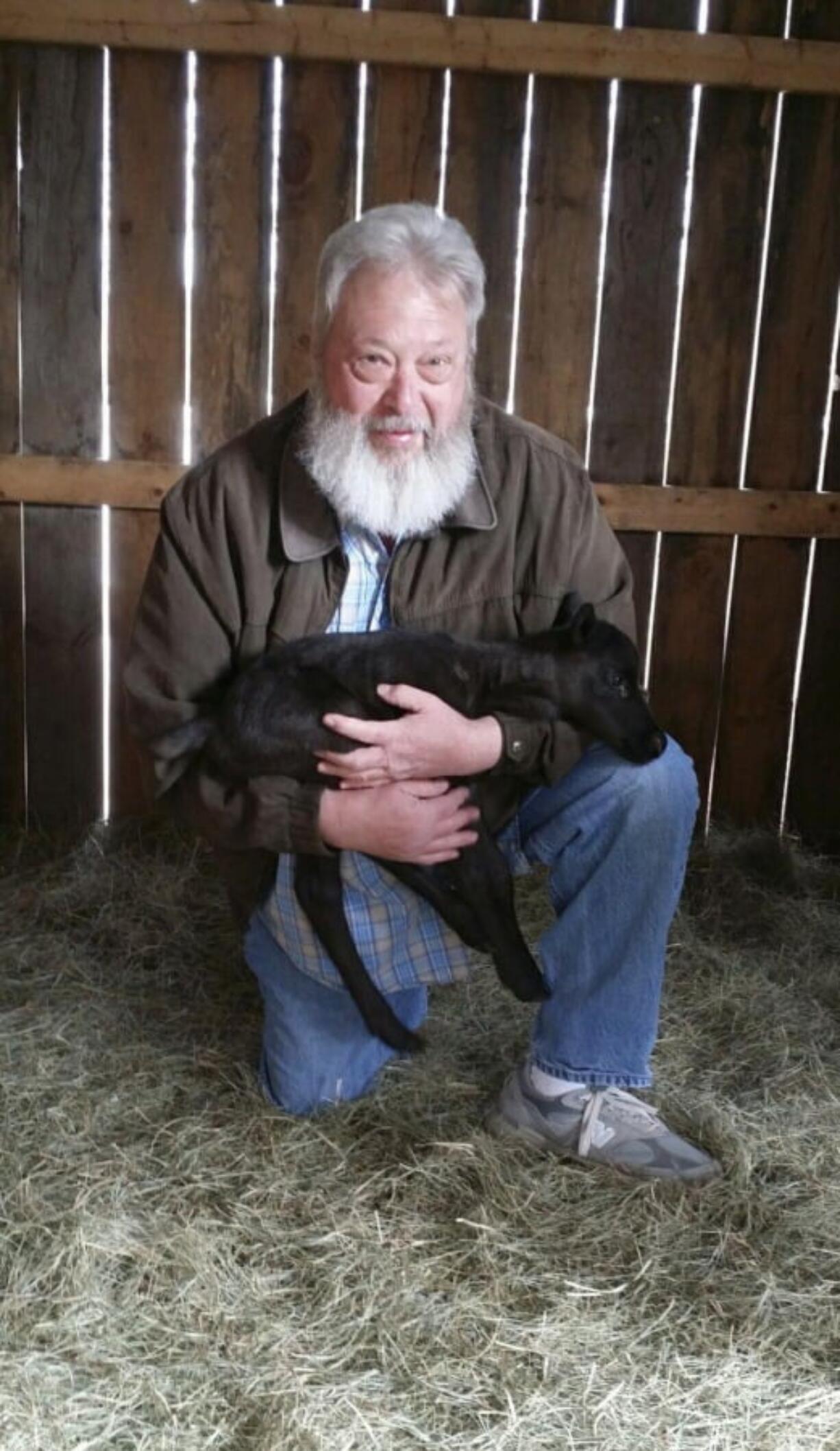 Ed Papsis of Pony X-Press Zoo holds Mistletoe, a newborn baby reindeer in Winslow, Maine. Mistletoe is the first reindeer baby born in Maine in more than 20 years. It was born on Easter Sunday.