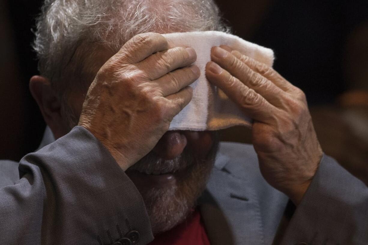 Brazil’s former President Luiz Inacio Lula da Silva wipes sweat from his face during his presidential campaign rally with members of his Workers Party and leaders of other left-wing parties in Rio de Janeiro, Brazil, Monday, April 2, 2018. Despite a conviction on corruption charges that could see him barred from running, da Silva is the front runner in that race.