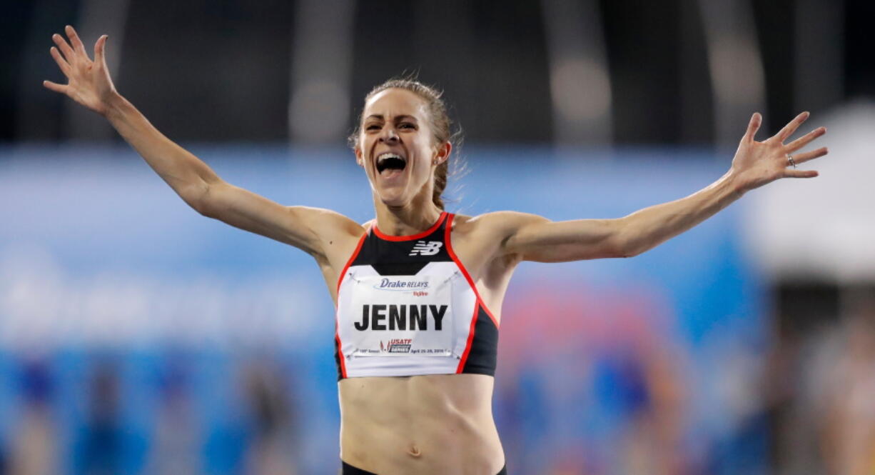 Jenny Simpson celebrates as she wins the women’s special two-mile run at the Drake Relays athletics meet, Friday, April 27, 2018, in Des Moines, Iowa.