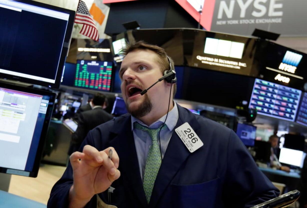 Trader Michael Milano works on the floor of the New York Stock Exchange, Monday, April 23, 2018. U.S. stocks are mixed Monday morning as health care and industrial companies make gains and energy companies slip with oil prices.