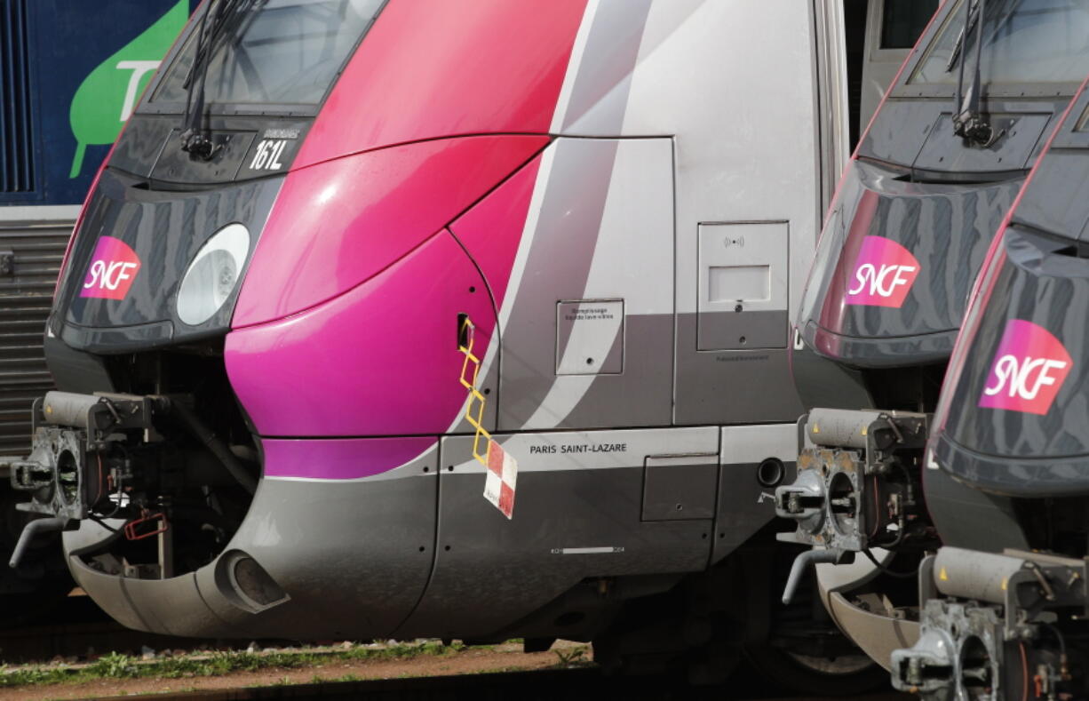 Trains are pictured at the Pont Cardinet train station in Paris, Wednesday, April 4, 2018. Tourists rearranged their travel plans and French commuters squeezed into scarce trains Wednesday, as Day 2 of a three-month strike hobbled one of the world’s most-traveled rail networks. Rail unions and President Emmanuel Macron’s government are holding firm so far in a battle over a plan to abolish a benefits system that allows train drivers and others jobs for life.