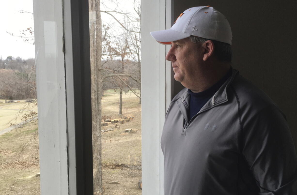 Marshall County resident Jeff Dysinger looks out a window in Benton, Ky. Dysinger’s daughter, Hannah, was injured by gunfire in the shooting at Marshall County High School on Jan. 23, but Dysinger, who owns an AR-15 rifle, is opposed to further gun reforms.