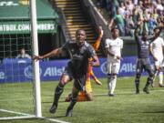 Portland Timbers forward Fanendo Adi celebrates his second goal of the season during an MLS soccer match against New York City FC in Portland, Ore., Sunday, April 22, 2018.