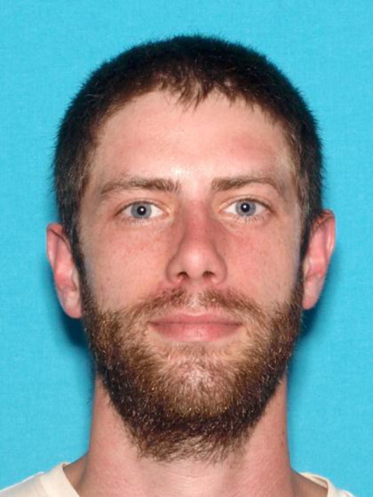 This undated identification photo released by the Maine State Police shows John Williams of Madison, Maine, who is being sought in connection with the shooting of a Somerset County sheriff’s deputy very early Wednesday morning in Norridgewock, Maine. Deputy Eugene Cole was killed while responding to a reported robbery. Police said Cole had been a deputy for 13 years and has a son.