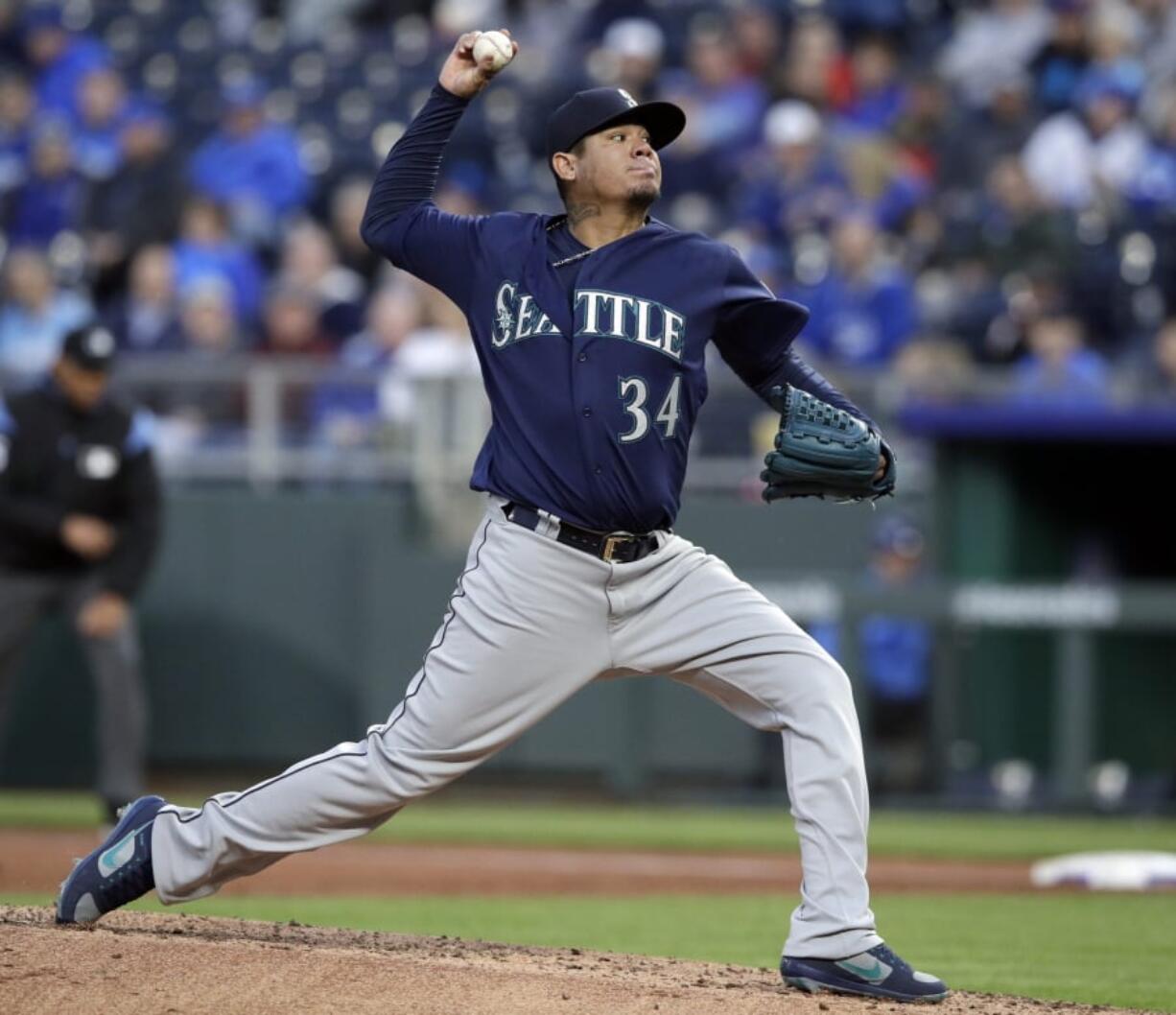 Seattle Mariners starting pitcher Felix Hernandez delivers to a Kansas City Royals batter during the first inning of a baseball game at Kauffman Stadium in Kansas City, Mo., Tuesday, April 10, 2018.