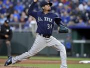 Seattle Mariners starting pitcher Felix Hernandez delivers to a Kansas City Royals batter during the first inning of a baseball game at Kauffman Stadium in Kansas City, Mo., Tuesday, April 10, 2018.