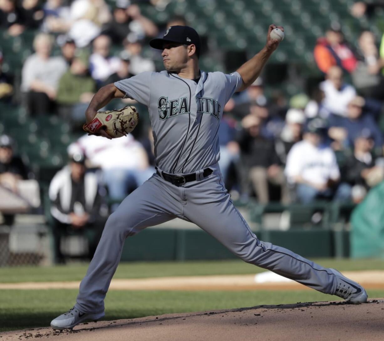 Seattle Mariners starting pitcher Marco Gonzales delivers during the first inning of a baseball game against the Chicago White Sox, Tuesday, April 24, 2018, in Chicago.