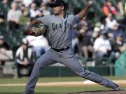 Seattle Mariners starting pitcher Marco Gonzales delivers during the first inning of a baseball game against the Chicago White Sox, Tuesday, April 24, 2018, in Chicago.