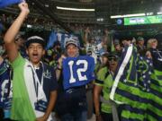 Seattle Seahawks fans cheer during the first round of the NFL football draft, Thursday, April 26, 2018, in Arlington, Texas.