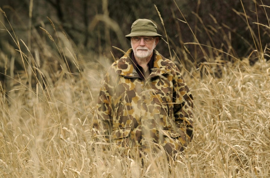 FILE - In this Nov. 20, 2008, file photo, Patrick F. McManus, is seen in Spokane, Wash. McManus, a prolific writer best known for his humor columns in fishing and hunting magazines who also wrote mystery novels and one-man comedy plays, has died. He was 84. McManus’ business partner Tim Behrens said Friday, April 13, 2018, that McManus died Wednesday evening, April 11 at a nursing facility in Spokane, Wash., where he had been in declining health.