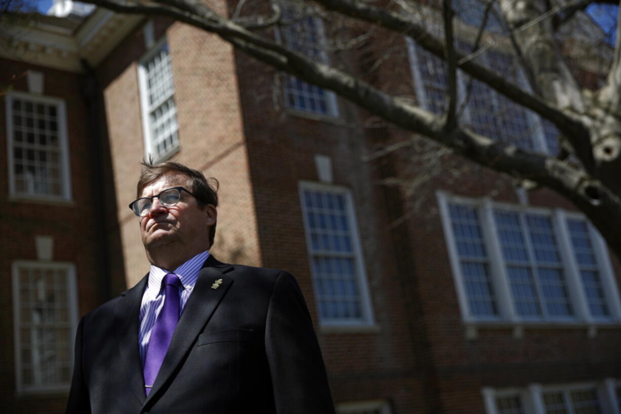 In this April 26, 2018 photo, David Humes stands outside Legislative Hall, the state capitol building, in Dover, Del. Humes, whose son died from a heroin overdose in 2012, has been pushing for an opioid tax in Delaware, which did not increase funding for addiction treatment in 2017 as it struggles to balance its budget. “When you think about the fact that each year more people are dying, if you leave the money the same, you’re not keeping up with this public health crisis,” he said.