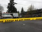 Clark County Sheriff's Office deputies with the Southwest Regional Major Crimes Unit investigate a crime scene at East 26th Street on in April.