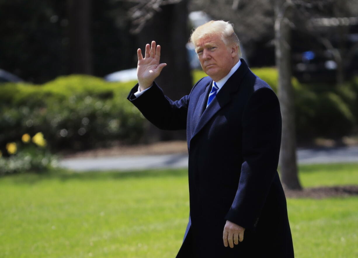 President Donald Trump makes his way to board Marine One on the South Lawn as he leaves the White House, Thursday, April 5, 2018 in Washington. Trump is traveling to West Virginia to hold a discussion on taxes in White Sulphur Springs.