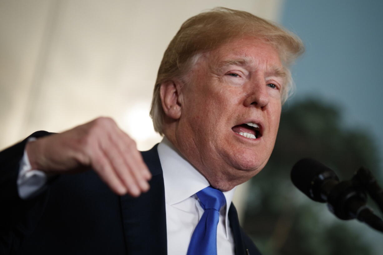 President Donald Trump speaks in the Diplomatic Reception Room of the White House in Washington.