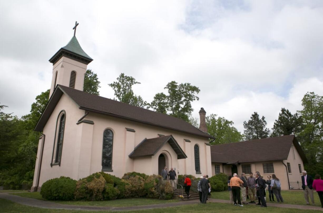 Churchgoers mingle after the service at Martin’s Brandon Episcopal Church’s 400th anniversary celebration on Sunday. This building dates to 1856. Left: Caroline Redfearn, 3, is the seventh generation of her family to attend Martin’s Brandon Episcopal Church.