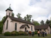 Churchgoers mingle after the service at Martin’s Brandon Episcopal Church’s 400th anniversary celebration on Sunday. This building dates to 1856. Left: Caroline Redfearn, 3, is the seventh generation of her family to attend Martin’s Brandon Episcopal Church.