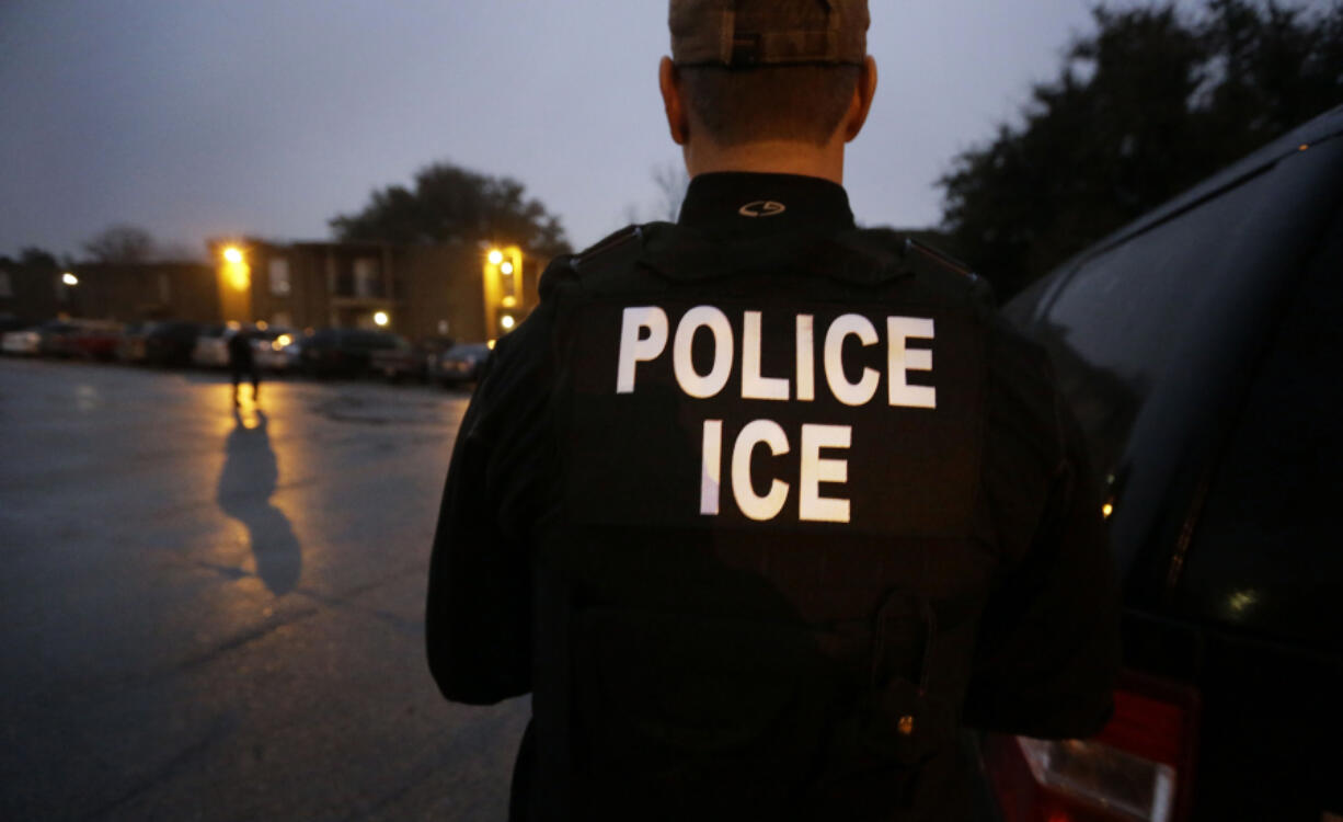 A reader posed a question about “sanctuary” areas recently to Clark Asks. The answer isn’t cut and dry in this controversial issue. Here, U.S. Immigration and Customs Enforcement agents enter a Dallas, Texas, apartment complex in 2015, looking for a specific undocumented immigrant convicted of a felony during an early morning operation.