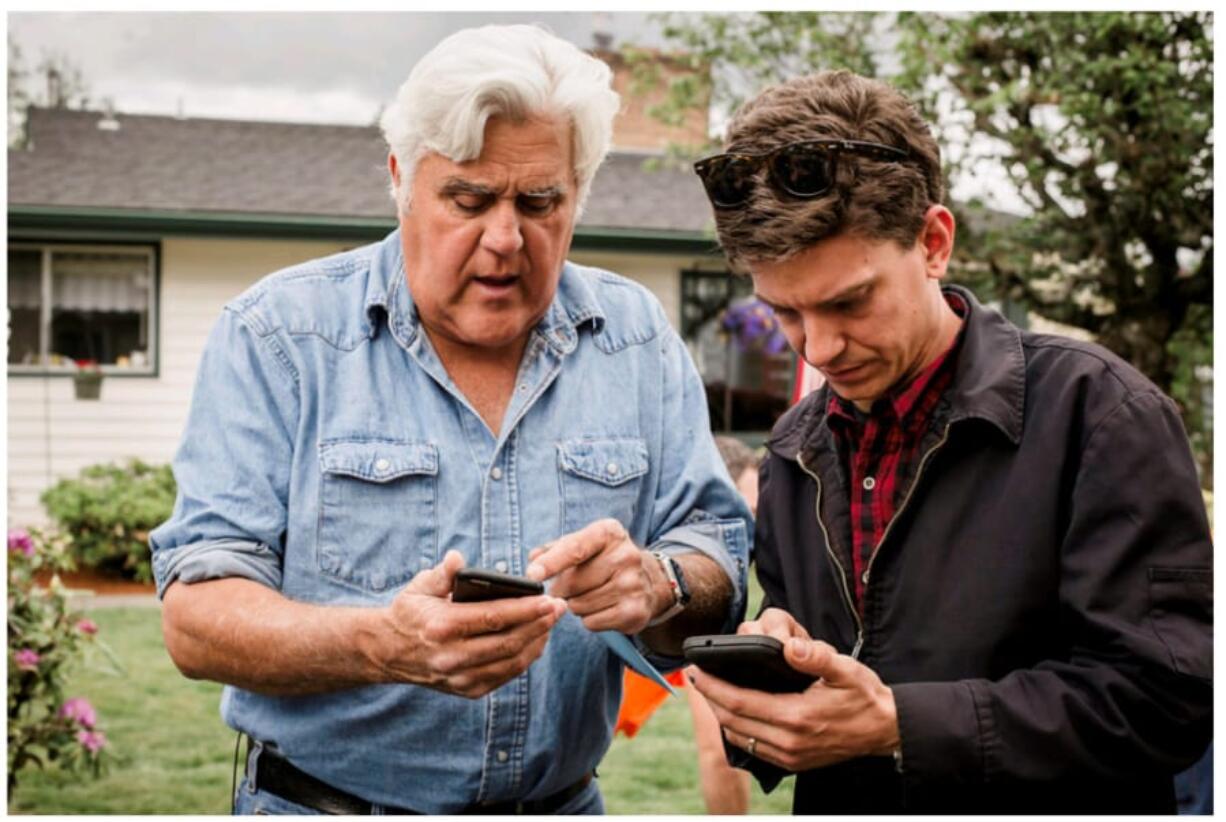 Jay Leno and Clayton Paddison confer during Wednesday’s filming session in Vancouver. (M.J.