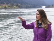 U.S. Representative Jaime Herrera Beutler looks towards sea lions near the Bonneville Dam on the Columbia River in 2018.