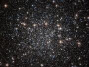 Located approximately 22,000 light-years away in the constellation of Musca, this tightly packed collection of stars — known as a globular cluster — goes by the name of NGC 4833.