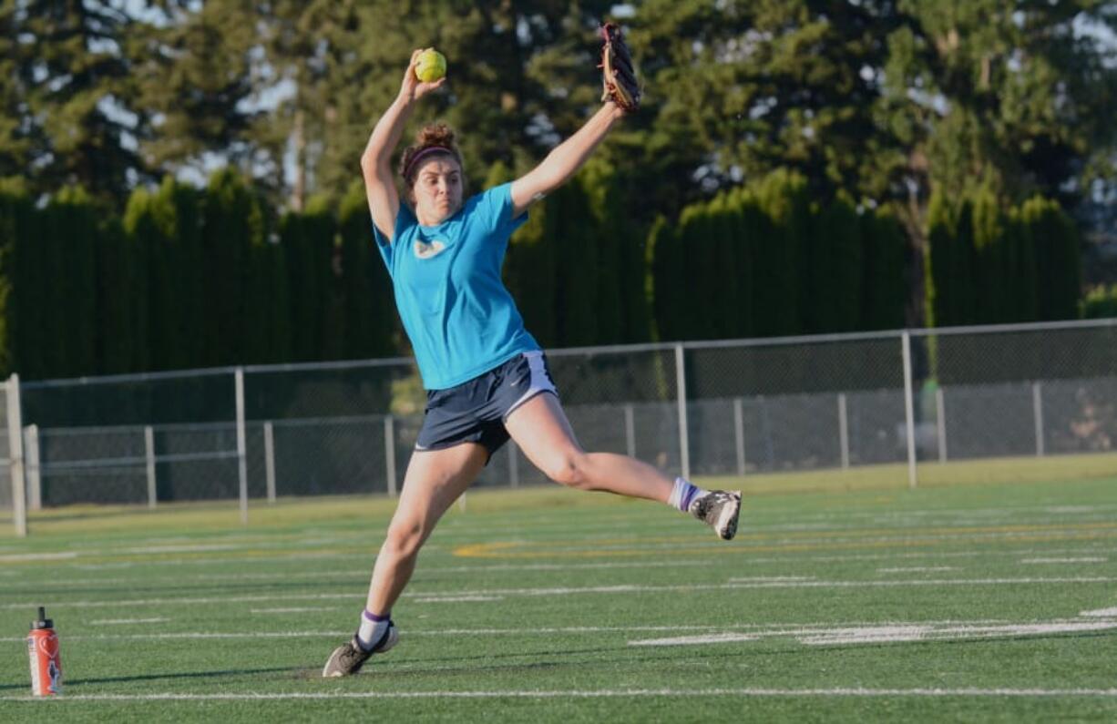 Sophomore Prairie pitcher Olivia Meyer practice a drill that helps her develop sharper accuracy at Prairie High School on Tuesday, May 22, 2018 in the week leading up to the Falcons’ appearance in the 3A state softball tournament (Andy Buhler/Columbian staff).