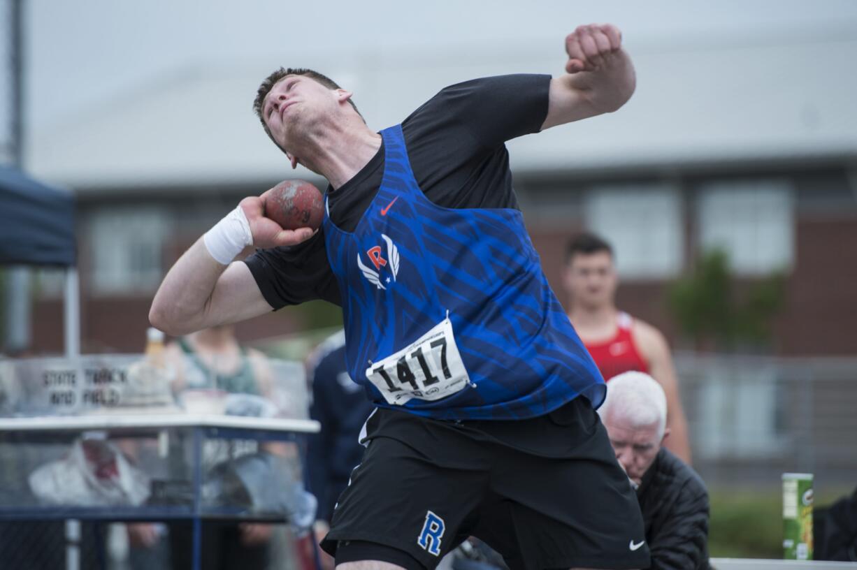 Ridgefield High sophomore Trey Knight won the Class 2A boys shot put Friday morning at Mount Tahoma Stadium with a mark of 61 feet, 11½ inches. (Dean J.