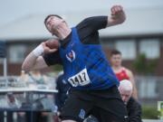 Ridgefield High sophomore Trey Knight won the Class 2A boys shot put Friday morning at Mount Tahoma Stadium with a mark of 61 feet, 11½ inches. (Dean J.