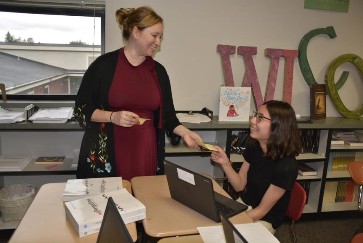 W Washougal High School teacher Vina Black delivers a Smile Gram to Daria Walker during a two-week stretch where students focused on kindness as part of a citywide effort known as #MSDKindness Month.