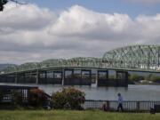 Matilda Fiskum, 1, left, of Portland strolls with her grandmother, Polly Withrow of Vancouver, along the Columbia River waterfront near the Interstate 5 Bridge in May.