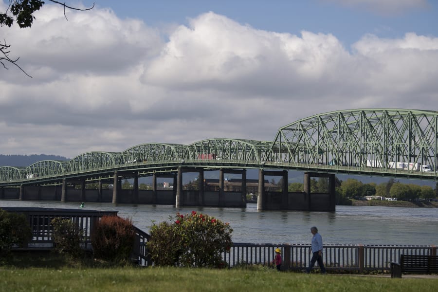 Matilda Fiskum, 1, left, of Portland strolls with her grandmother, Polly Withrow of Vancouver, along the Columbia River waterfront near the Interstate 5 Bridge in May.