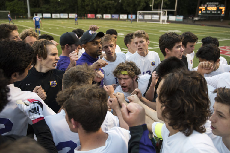 Columbia River huddles for a cheer before the second half of the the 2A district semifinal at Kiggins Bowl on Tuesday, May 8, 2018. Columbia River won 3-0 and will move on to play Woodland  in Thursday's district final.