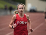 Fort Vancouver’s Emily Phelps competes in the 3,200-meter run during the second day of the 4A, 3A district track and field meet at McKenzie Stadium in Vancouver on Thursday, May 10, 2018. Phelps placed first with a time of 11:15:46.