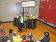 Washougal: Sharon Whalen, with Duck Delivery Produce in Portland, teaches Hathaway Elementary School students about fresh produce as part of the school’s Student Well-Being Fair.