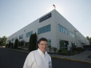 Mark DeVito, vice president of device engineering at nLIGHT, pauses for a photo outside the firm’s Vancouver office. DeVito helps steer the technology that has helped make nLIGHT a valuable, publicly traded company.