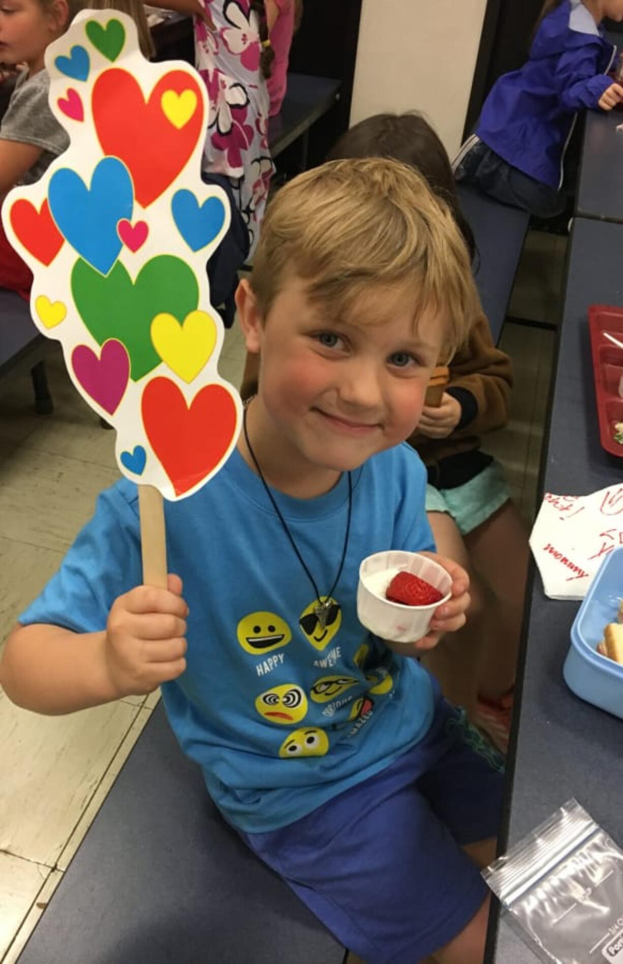 East Vancouver: Burton Elementary School student Frankie DiPietra shows his approval of the local strawberries featured in the most recent Harvest of the Month tasting.